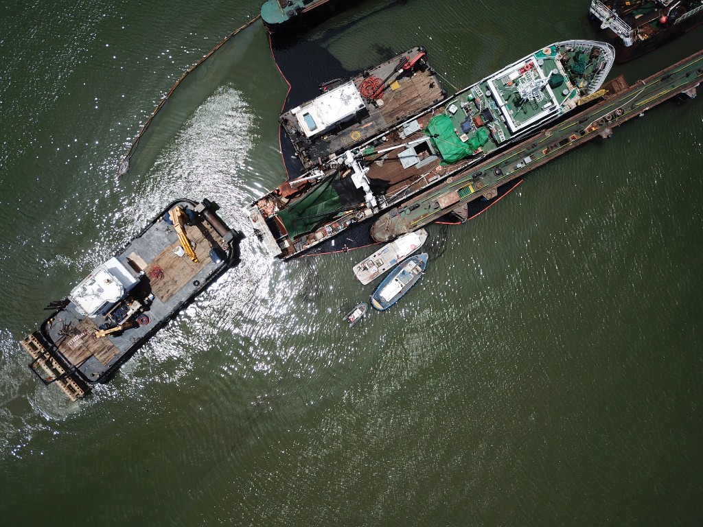 Aerial view of vessel maneuver and containment